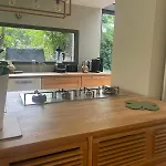 Glass And Wood Designer Villa With Garden In Centertown