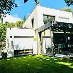 Glass And Wood Designer Villa With Garden In Centertown