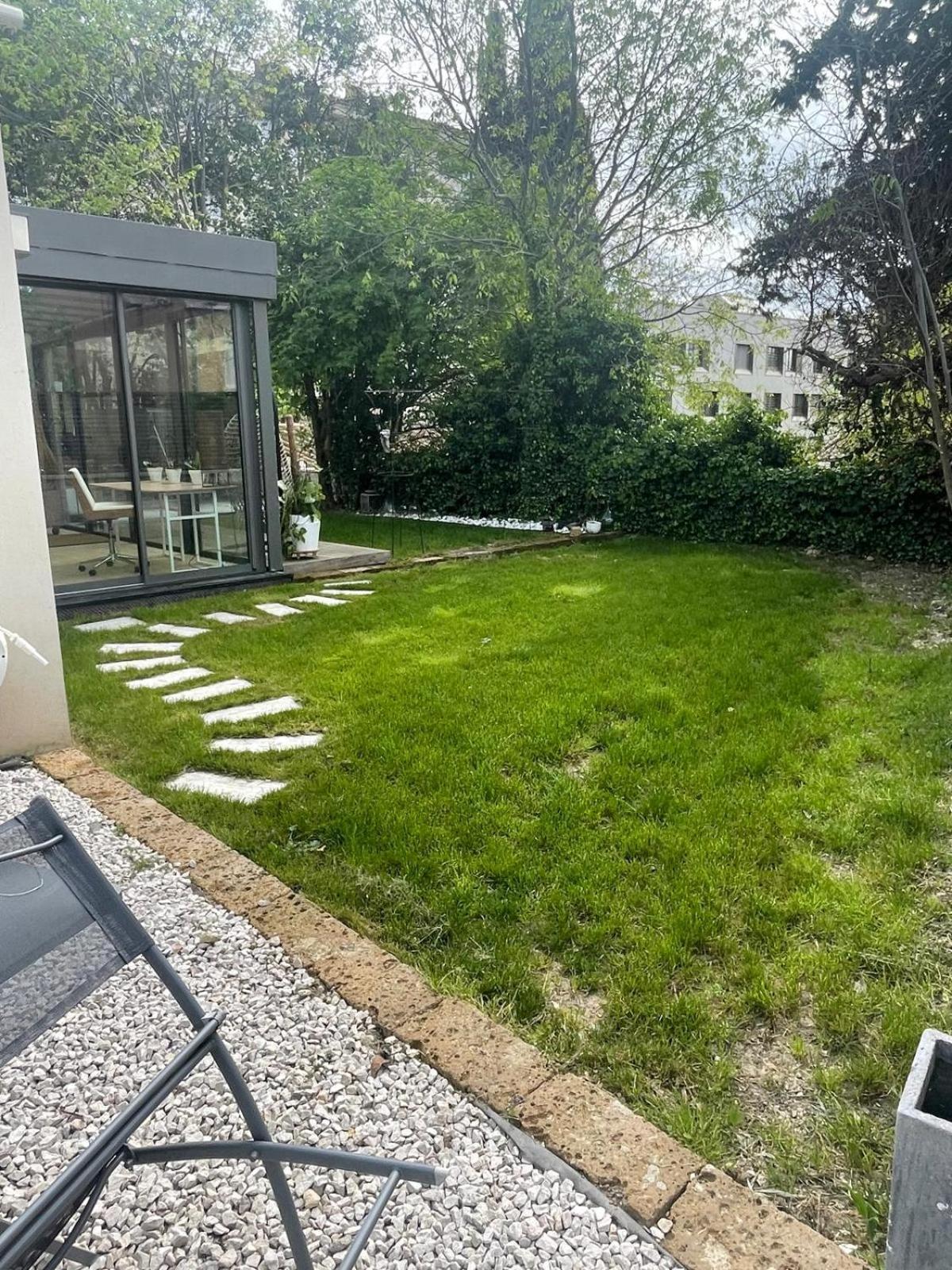 Glass And Wood Designer With Garden In Centertown
